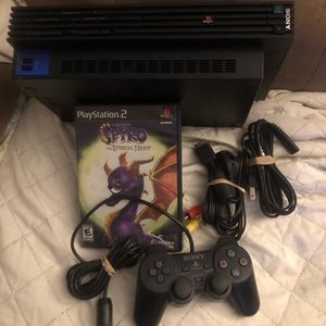 PS2 with controller and Spyro game